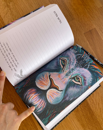 Extra notes page for August from the Infinite Journal by Ira Light, featuring space for additional affirmations and reflections. Enhanced by a vibrant drawing of a lion, complete with fabulous colours and light codes on its face, created by local Australian artist Stacie Spiler, symbolising courage and strength.
